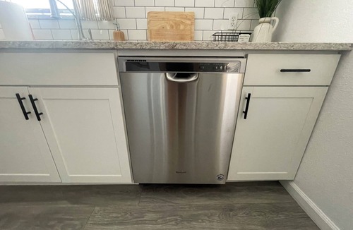 Central Colorado Springs Apartment | ✔ Downtown location ✔ Upper-level apartment ✔ Smart TVs & modern kitchen ✔ Outdoor seating with grill and firepit