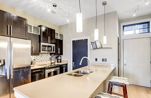 River District Apartment | Downtown Modern Apt, Pavilion