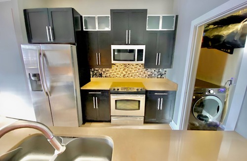 River District Apartment | Downtown Modern Apt, Pavilion