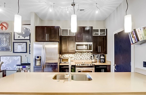 River District Apartment | Downtown Modern Apt, Pavilion