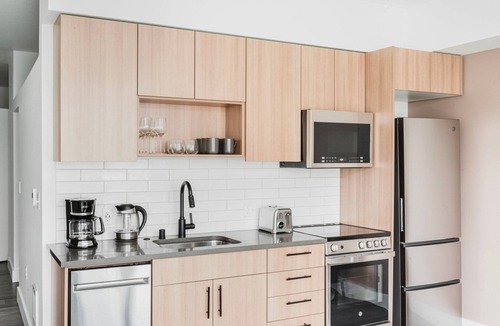 Squire Park Apartment | Dreamy First Hill Jr 1BR w/Bike Storage, Gym & W/D, by Blueground