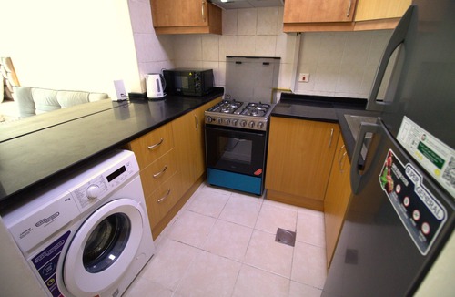 Discovery Gardens Apartment | DRUVYA HOLIDAY HOMES, Bld DG194, Street No,2 Discovery Gardens, Close to Metro