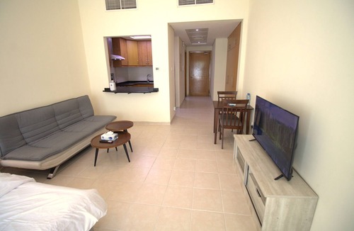 Discovery Gardens Apartment | DRUVYA HOLIDAY HOMES, Bld DG194, Street No,2 Discovery Gardens, Close to Metro