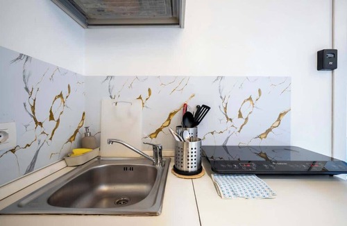 Sant' Ambrogio Apartment | Duomo Studio Room with Private Bath and Kitchenette
