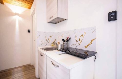 Sant' Ambrogio Apartment | Duomo Studio Room with Private Bath and Kitchenette