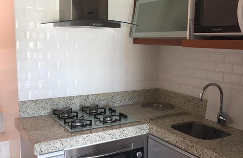 Porto da Lagoa Apartment | Duplex facing Lagoa Conceição and Resort structure in a closed condominium