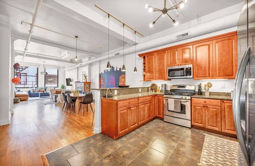 Gateway District Apartment | E 4th Loft w/Mini Golf, Shuffleboard & Games