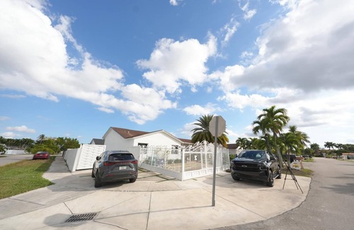 Tamiami House | E&A SouthWest - Sandy Beach Suite with Private Terrace