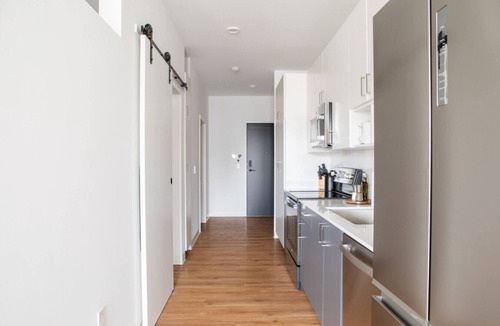 Yankee Hill Apartment | East Side 1BR Apt with Balcony, Pool, and Gym