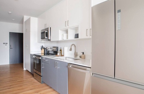 Yankee Hill Apartment | East Side 1BR Apt with Balcony, Pool, and Gym