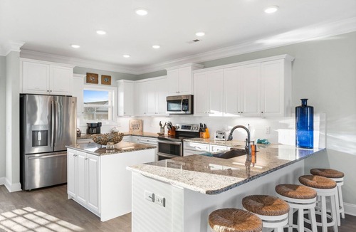 Sunset Beach House | Easy Breezy is a 4 bedroom, 5 bathroom house w/private pool & elevator