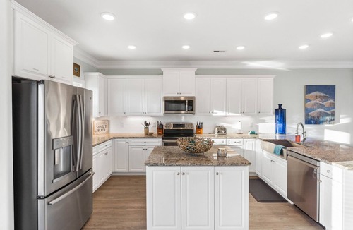 Sunset Beach House | Easy Breezy is a 4 bedroom, 5 bathroom house w/private pool & elevator