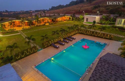 Karjat Villa | EKOSTAY Luxe - Woodstock Villa I 2 Acre Property I Cricket Turf I Party Friendly