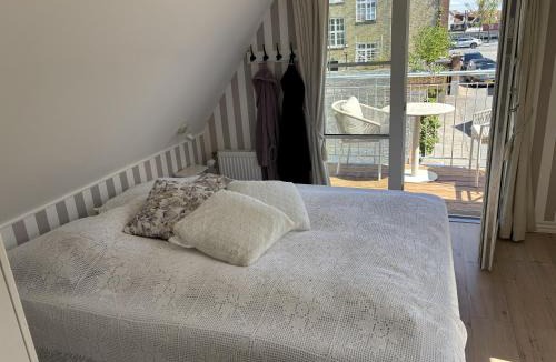 Kerteminde Apartment | Eksklusiv penthouselejlighed med altan og havnekik