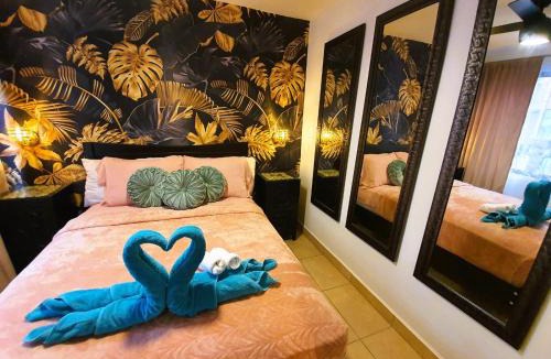 Barrio Ricos y Famosos Apartment | El Encanto Condominiums