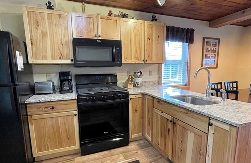 St Germain House | Elbert’s Resort lakeside cabin with dock and Timber’s bar and grill on site!
