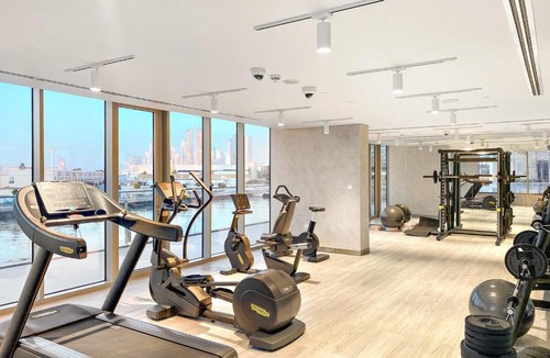 Al Safa Apartment | Elegant 1BR Apt with Balcony Views of Burj Khalifa & Dubai Canal