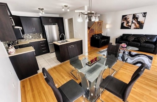 Vaudreuil House | Elegant 3BR Townhome with Lounge & Parking