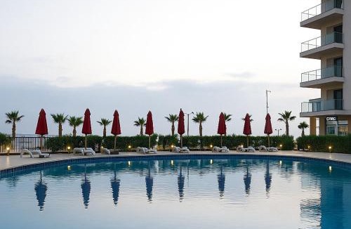Al-Manasrah Ski Chalet | Elegant Beachfront Chalets at Porto Said Resort Your Perfect Escape