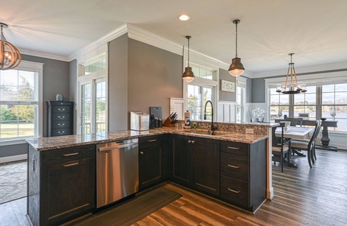 Livingston House | Elegant lakefront home with water access, hot tub, dock, rec room & fireplaces