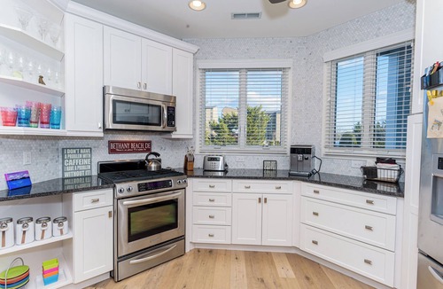Bethany Beach House | Elegantly designed 4 bed, 4.5 bath home in the exclusive Sandcastle Community of Sea Colony; Private Beach, Community Pools, Fitness, Tennis, Playgrounds, Basketball Courts.