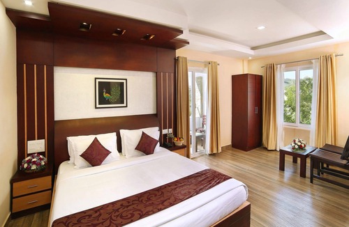 Munnar Hotel | Elysium Gardens Hill Resorts