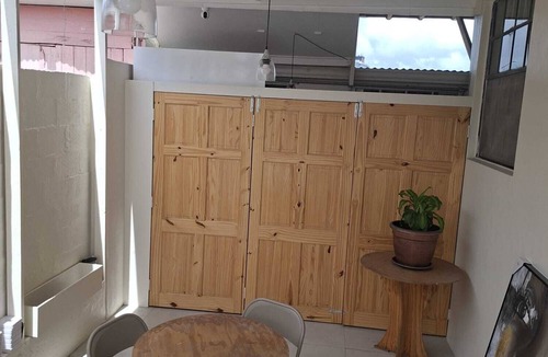 Henrys Apartment | Emerald Haven 1-bedroom apartment with AC designed for comfort & convenience