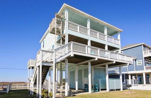 Stavanger Beach Condo | Enchanted Beachfront by Ryson Vacation Rentals