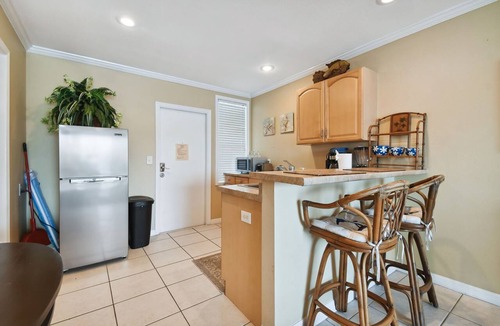 Bay Esplanade Apartment | Enchanted Inn Suite #5: Waterfront, Pool, Fishing Dock, Boat Docks & Tiki Bar!