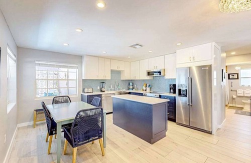 Isles of Capri House | Enchanting dog-friendly beach bungalow with patio, fireplace, deck, AC, & W/D