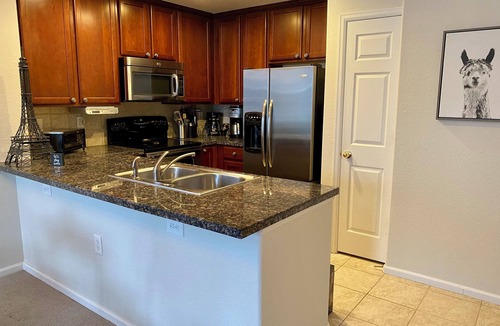Aurora House | End-unit townhome with garage, patio, and office, near shopping and trails!