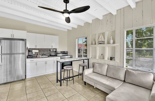 Northeast Miami Apartment | Endless Summer Riverfront Manatee Serenity