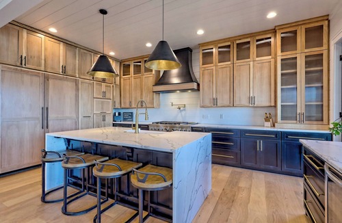 Elf House | Endless Sunsets by Chatuge Home Concierge | Lakefront home with private dock, covered boat slip, sun deck, hot tub, bar, fire pit, pool table, kayaks and EV charger. The perfect spot to relax, play, and enjoy unforgettable sunset views.
