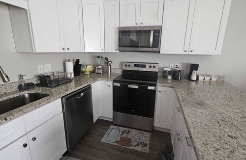 Harrisburg Condo | Enjoy a convenient 3BR House near —Charlotte Motor Speedway & Uptown Charlotte.