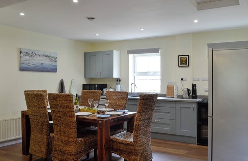 Mauchline Cottage | Enjoy a game of tennis or simply relax in the hot tub at The Brewers Cottage.