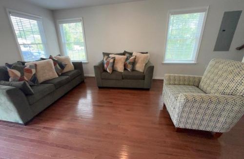 Mount Vernon House | Enjoy a spacious 4 bedroom home each with its own private bathroom featuring 1 king bed 2 queen beds 1 full bed and a dedicated office space in a quiet Alexandria suburb just minutes from Washington DC