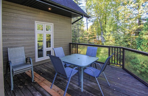 Saint-David-de-Falardeau Ski Chalet | Enjoy our cozy waterfront chalet with a private hot tub, stunning views,