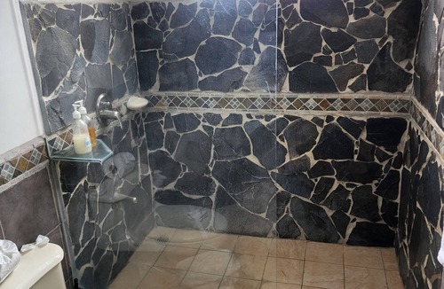 Barrio Los Villalobos Condo | Enjoy the beach view while sitting on the lanai