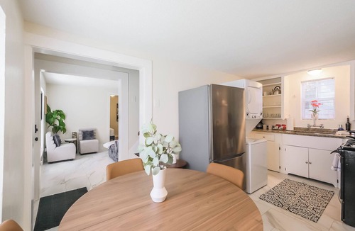Shady Acres House | Enjoy two separate, fully furnished homes on one property — perfect for large groups. The front one-story home offers 3 bedrooms and 1 bath, while the back two-story home features 3 bedrooms, 2 baths, and an upstairs family room with 2 beds