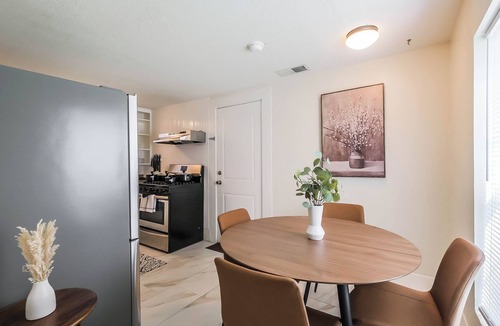 Shady Acres House | Enjoy two separate, fully furnished homes on one property — perfect for large groups. The front one-story home offers 3 bedrooms and 1 bath, while the back two-story home features 3 bedrooms, 2 baths, and an upstairs family room with 2 beds