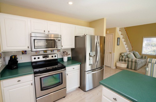 Sea Scape House | Entire home in Kitty Hawk, NC. Pool, hot tub, & spacious backyard!