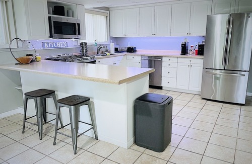 Freeport House | Entire lower level in a private home with walkout fenced yard.
