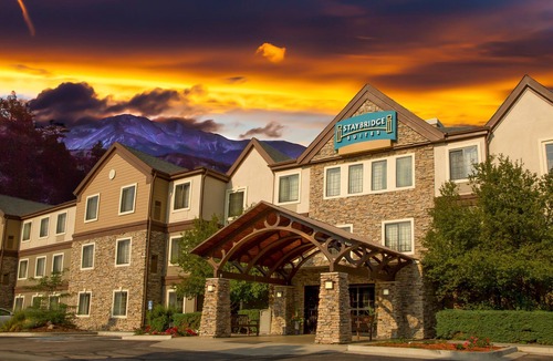 Rockrimmon Condo | Equipped Suite with Mountain View | Outdoor Pool Access, Housekeeping + Business Center
