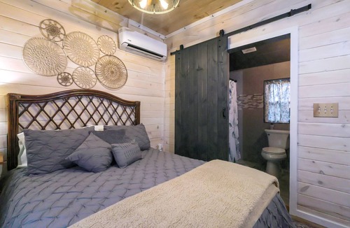 Corinth Cabin | Escape the city at "In the Meadow," a serene cabin in Kentucky's countryside.