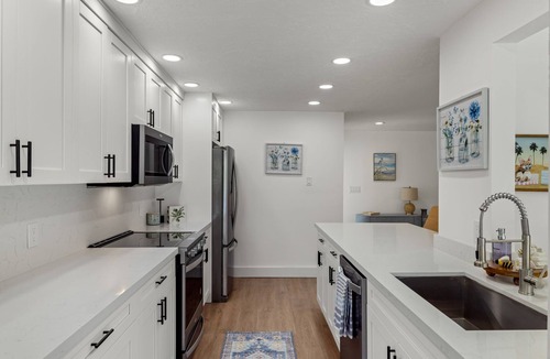 Shell Harbor House | Exceptional canal front home, beautiful design, steps to beach!