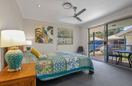Tin Can Bay House | Exceptional modern three bedroom townhouse with water on both sides.
