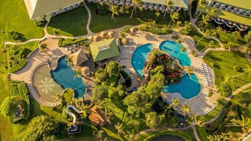 Hanamaulu Apartment | Exclusive Kauai Beachfront Resort with Dining, Bar, Spa, Pool & Waterslide