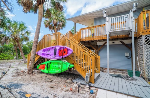 Palm Island House | Exclusive Palm Island 2br/2ba Home with Pool, Hot Tub, Dock, & 7-Mile Beach