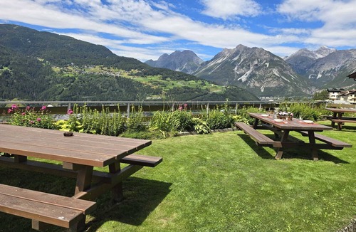 Valtellina Ski Chalet | Exclusive rustic chic chalet with large furnished rooftop garden