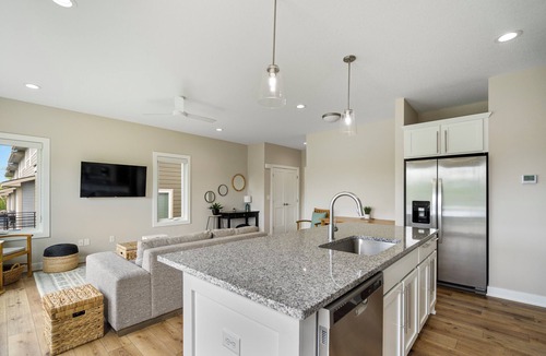 West Des Moines House | Exclusive Scenic Escape End Unit New Construction Jordan Creek w/2 Car Garage